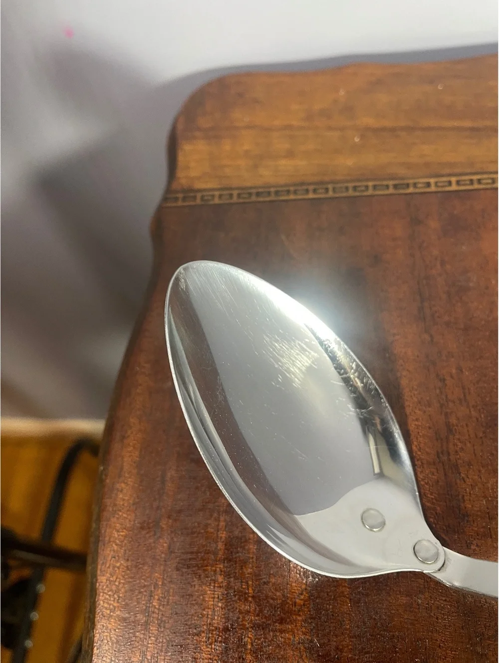 Cutco Vintage Stainless Steel Serving Spoon with Black Handle